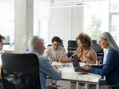 people sitting around a table working