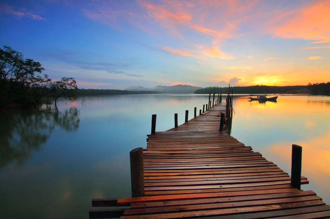 Sunset lake with jetty
